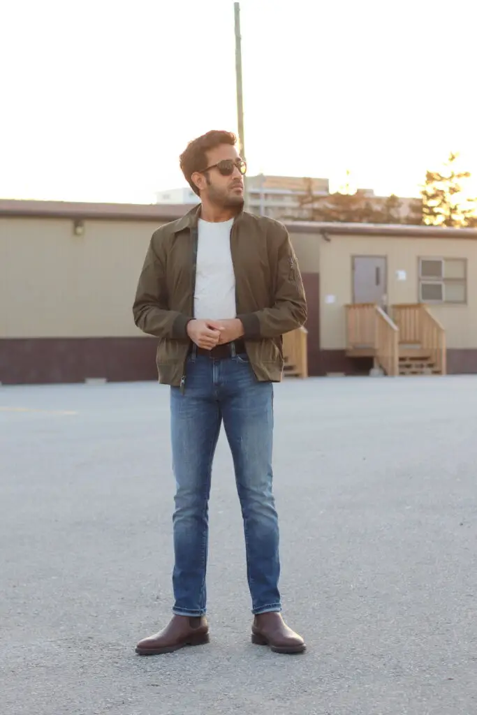 bomber jacket, white t-shirt , light wash jeans and chelsea boots