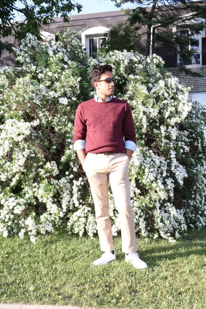 khaki pants with maroon sweater, dress shirt and white sneakers