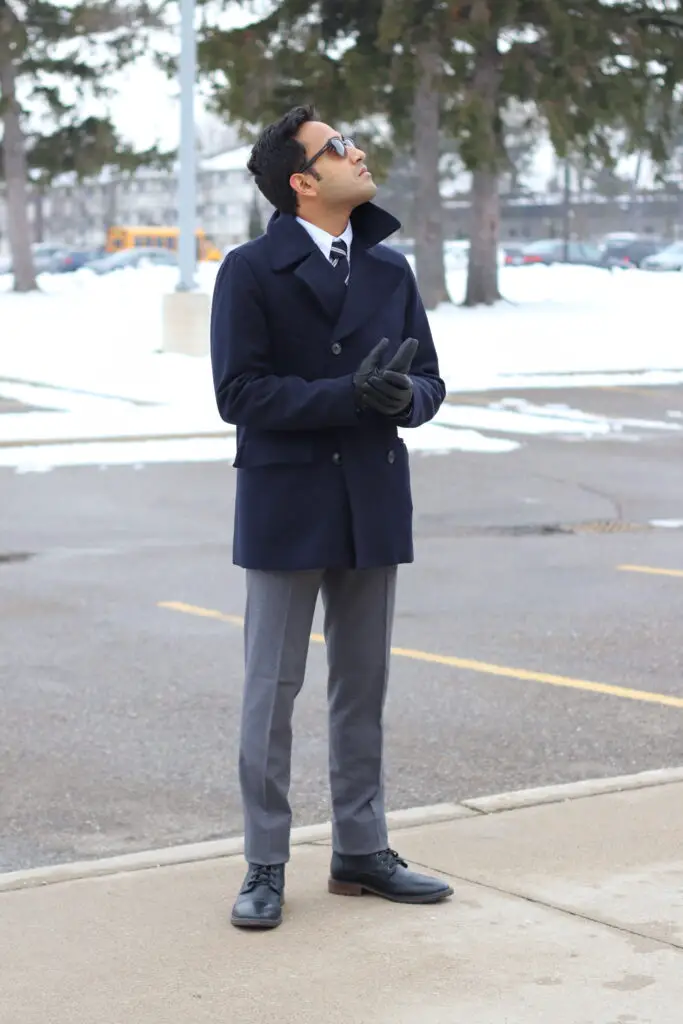 navy blue business casual peacoat with grey suit and black boots
