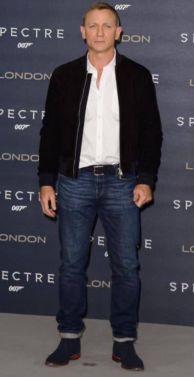james bond wearing dark blue jeans , jeans for men over 50 